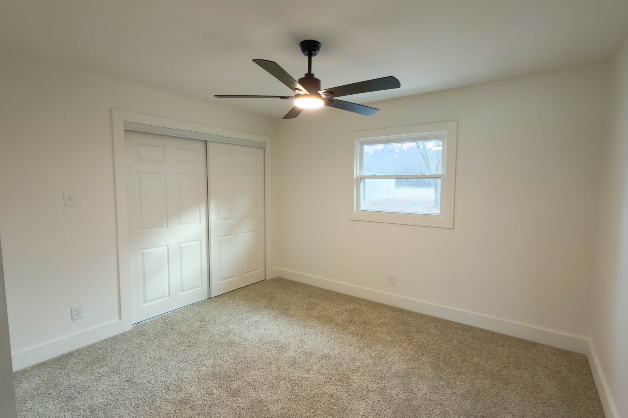 2239 Hunter Bills Road Lewisburg, TN 37091 - Photo 25 of 53 an empty room with a window and a fan