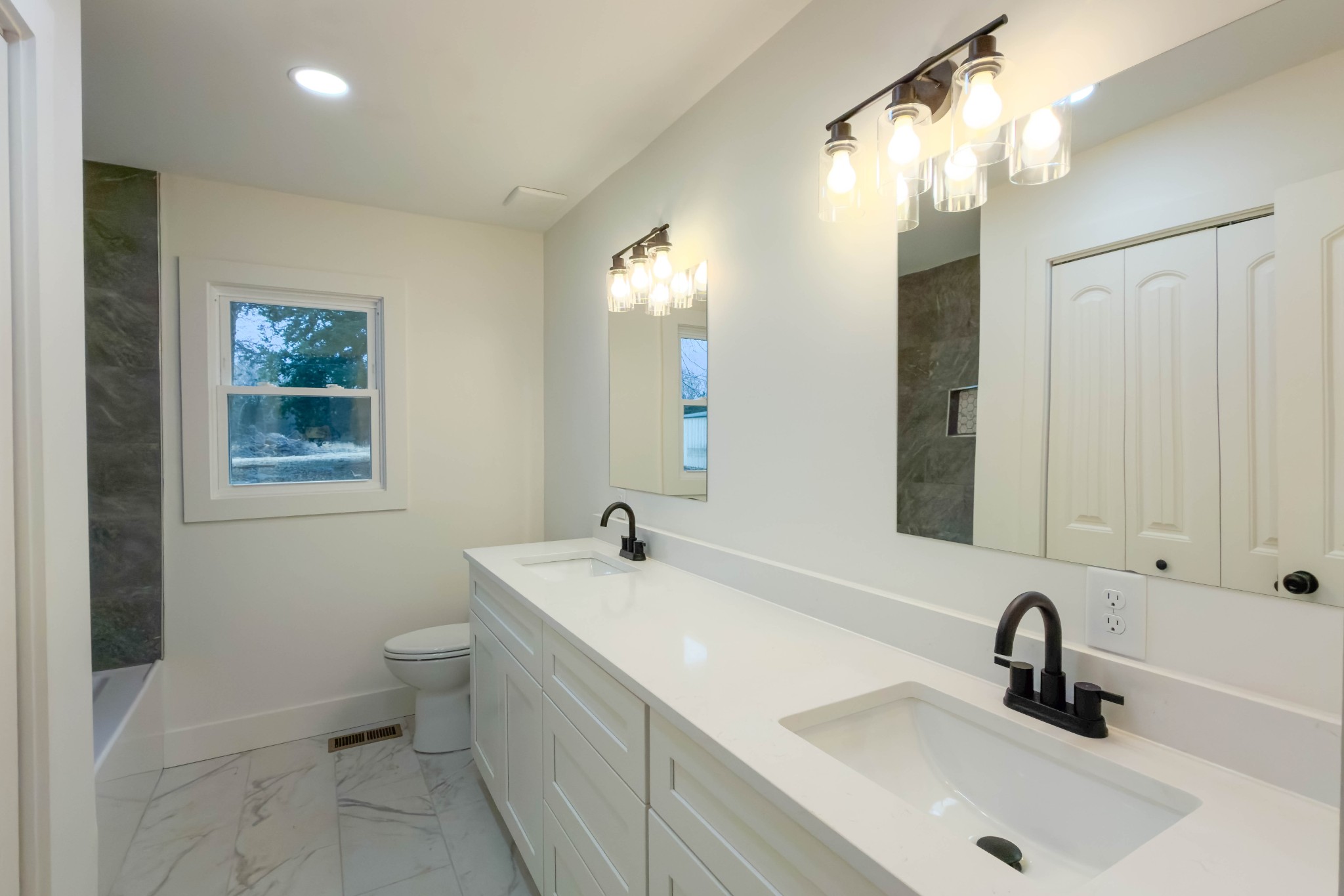 2239 Hunter Bills Road Lewisburg, TN 37091 - Photo 31 of 53 a bathroom with a sink and a mirror