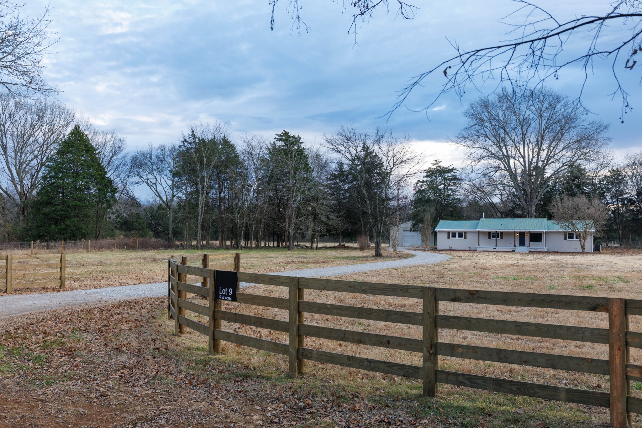 2239 Hunter Bills Road Lewisburg, TN 37091 - Photo 50 of 53 a view of backyard with wooden fence and trees