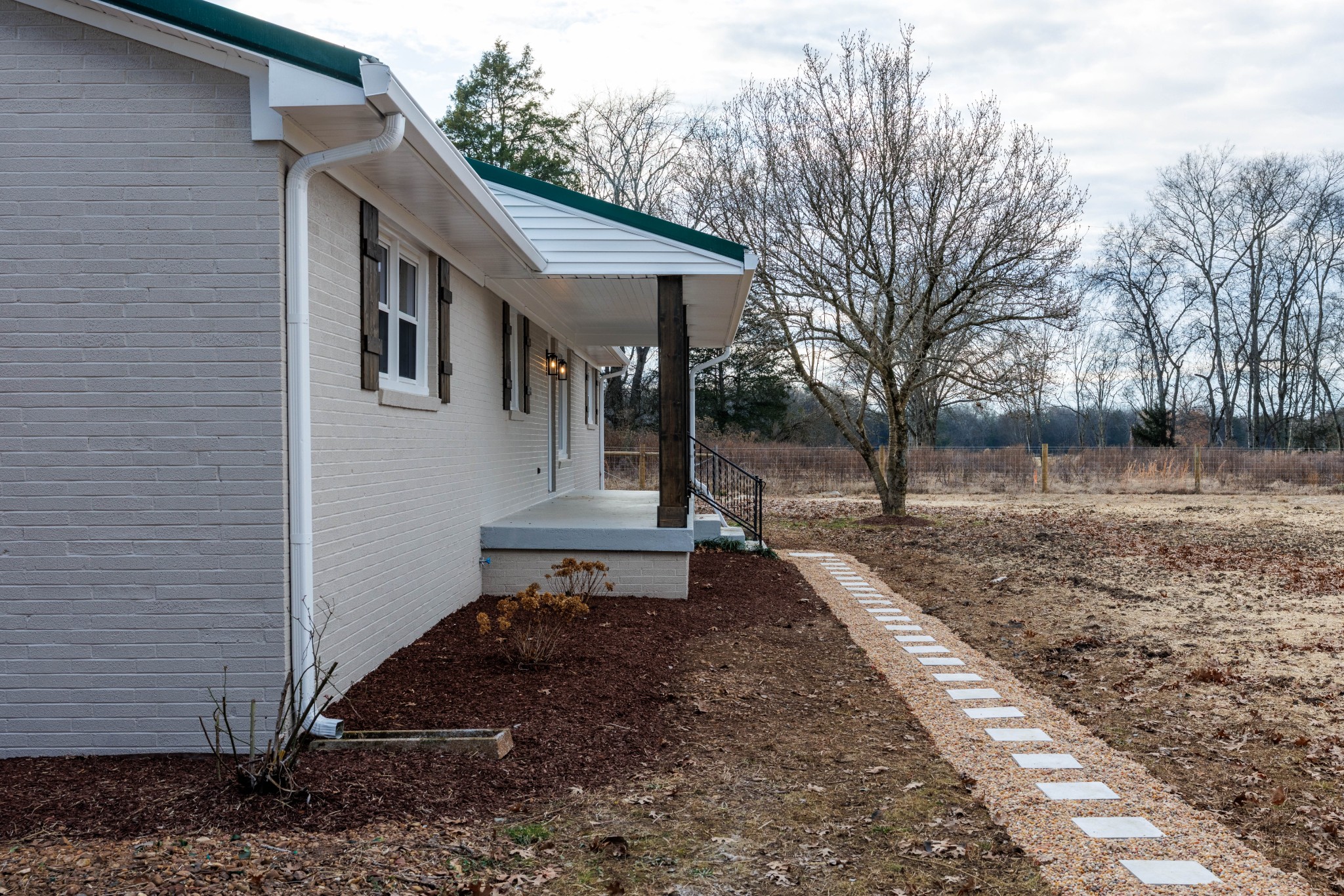 2239 Hunter Bills Road Lewisburg, TN 37091 - Photo 8 of 53 a view of a house with backyard and a trees