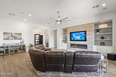 a view of a dining room with furniture and wooden floor