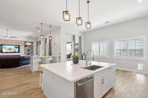 a kitchen with a stove and a refrigerator
