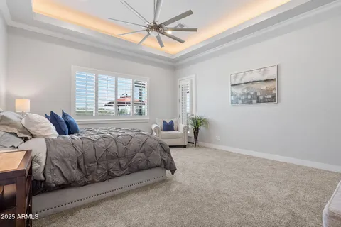 a en suite bathroom with double sink and a mirror