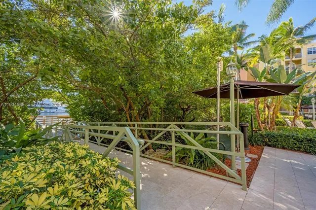 a view of a house with swimming pool and porch