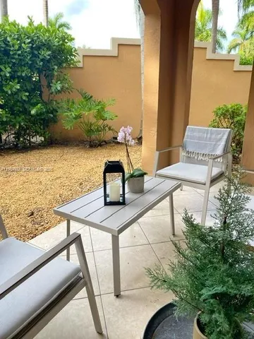 a bedroom with a bed and chair