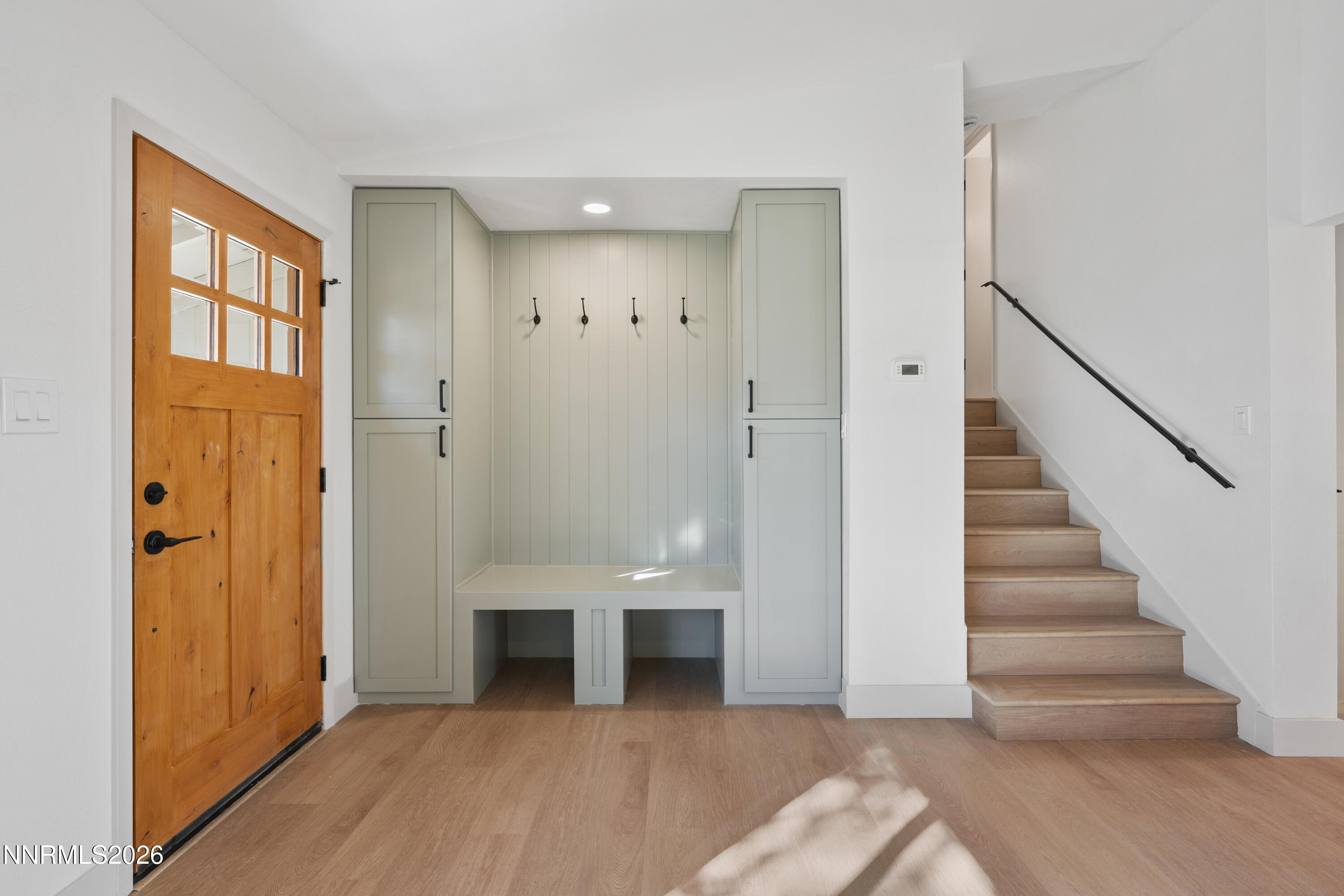 8 Zane Grey Lane Reno, NV 89523 - Photo 13 of 43 a view of a hallway with wooden floor and entryway