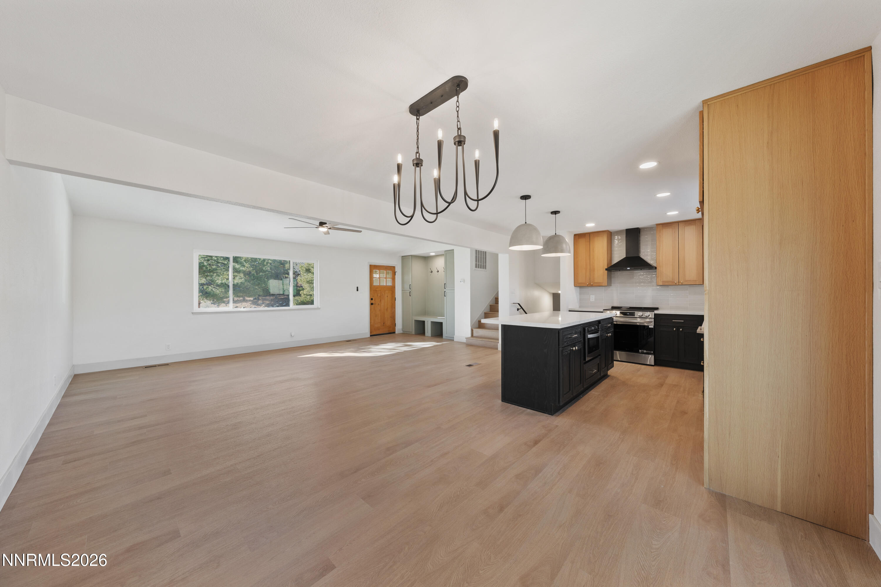 8 Zane Grey Lane Reno, NV 89523 - Photo 16 of 43 a large room with kitchen view