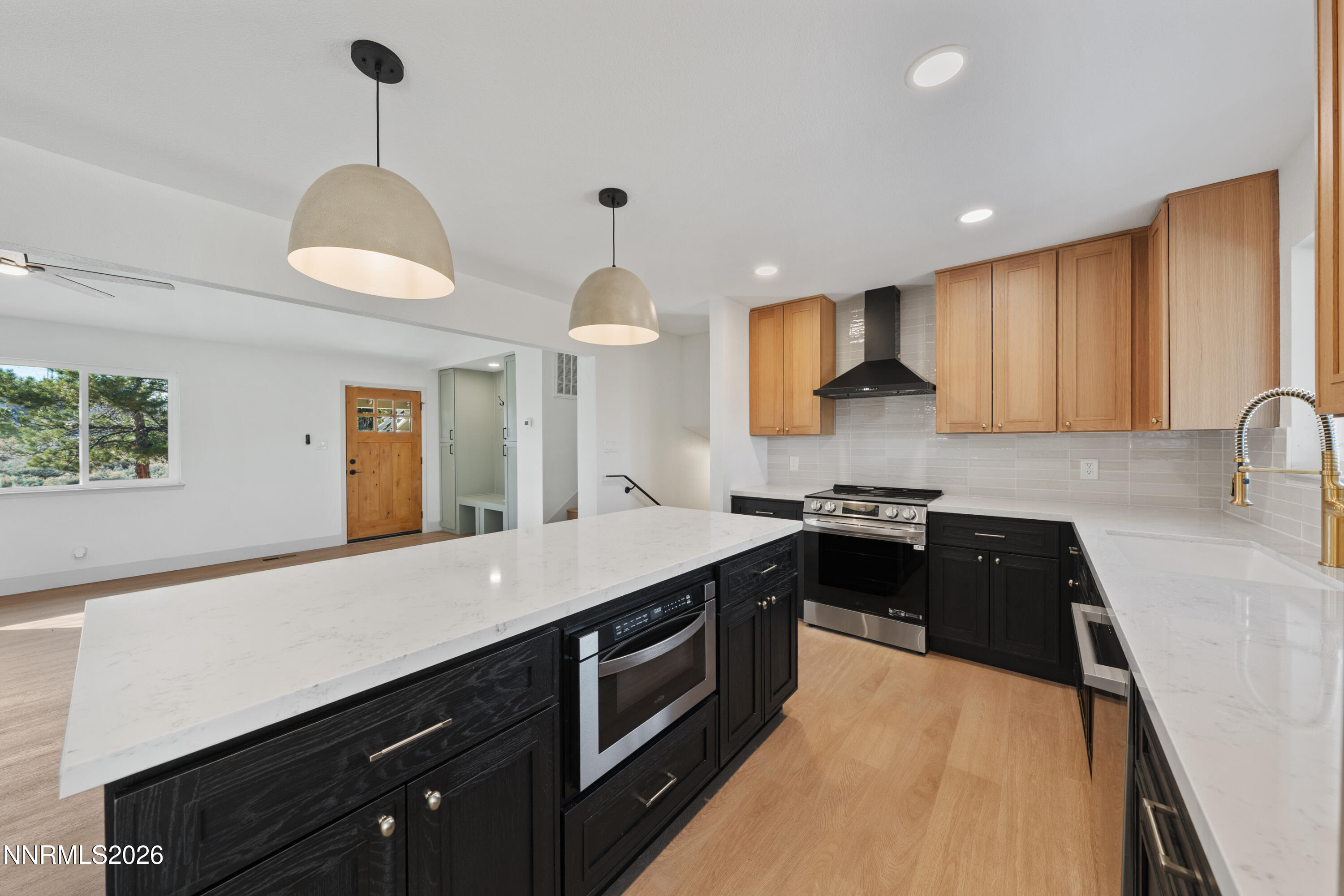 8 Zane Grey Lane Reno, NV 89523 - Photo 17 of 43 a kitchen with a sink and stove