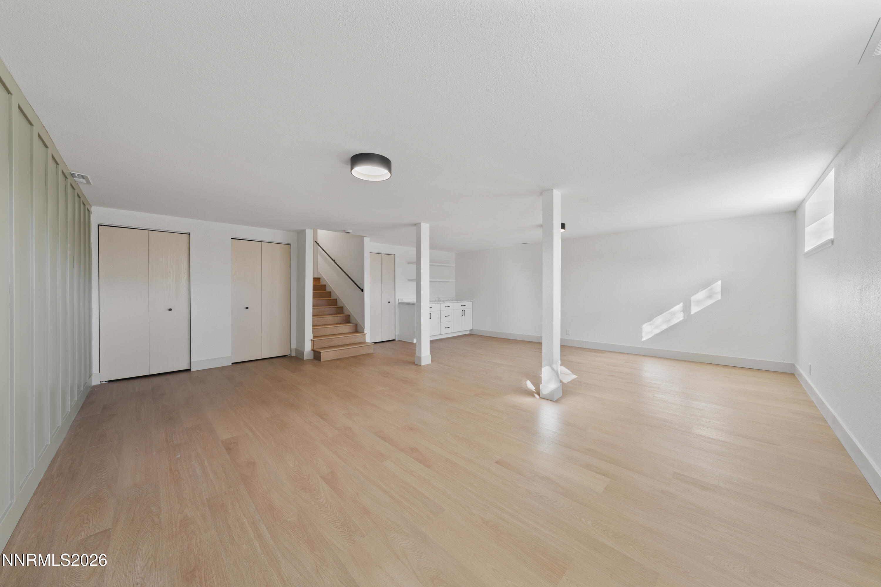8 Zane Grey Lane Reno, NV 89523 - Photo 25 of 43 a view of empty room with wooden floor
