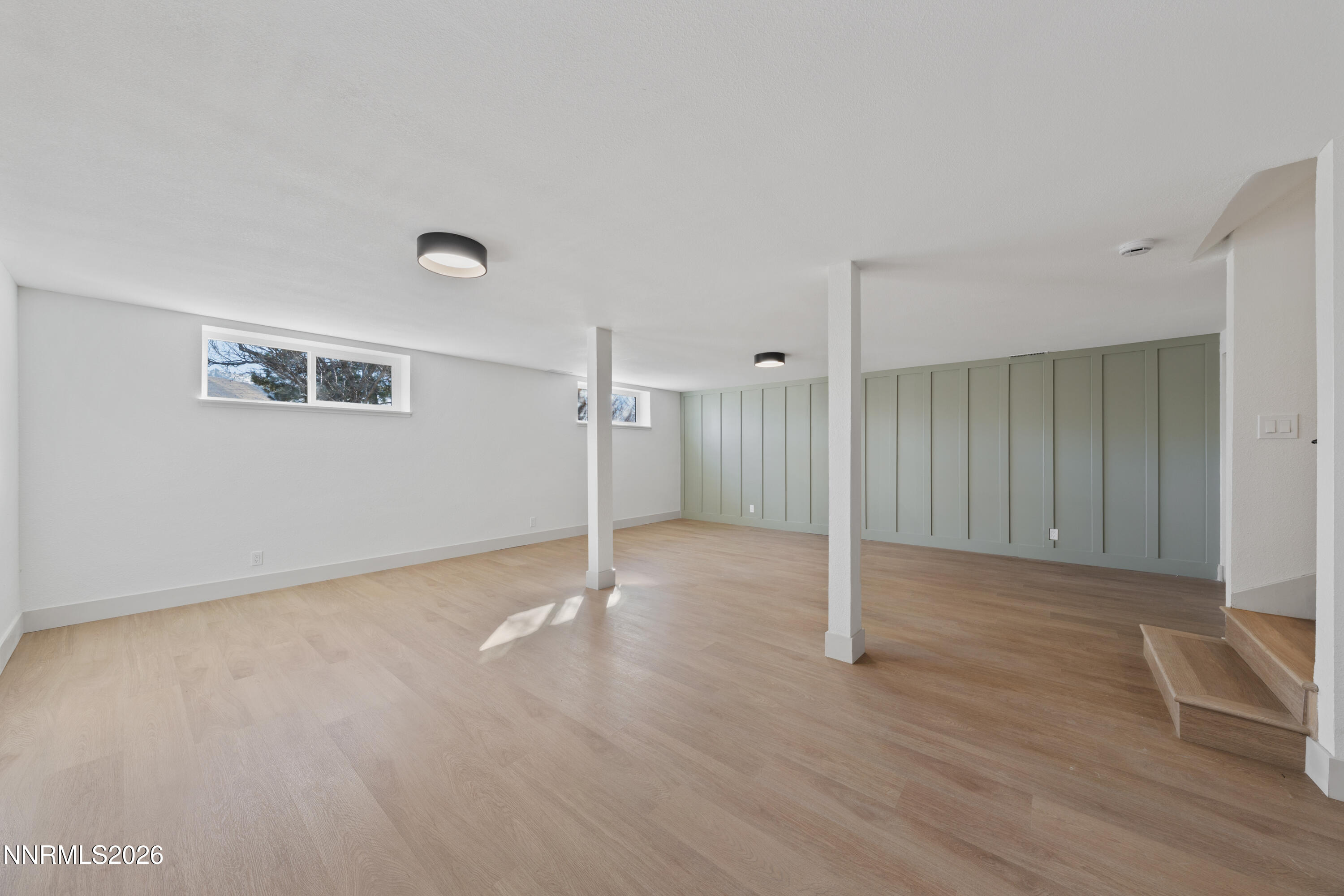 8 Zane Grey Lane Reno, NV 89523 - Photo 27 of 43 a view of an empty room with wooden floor
