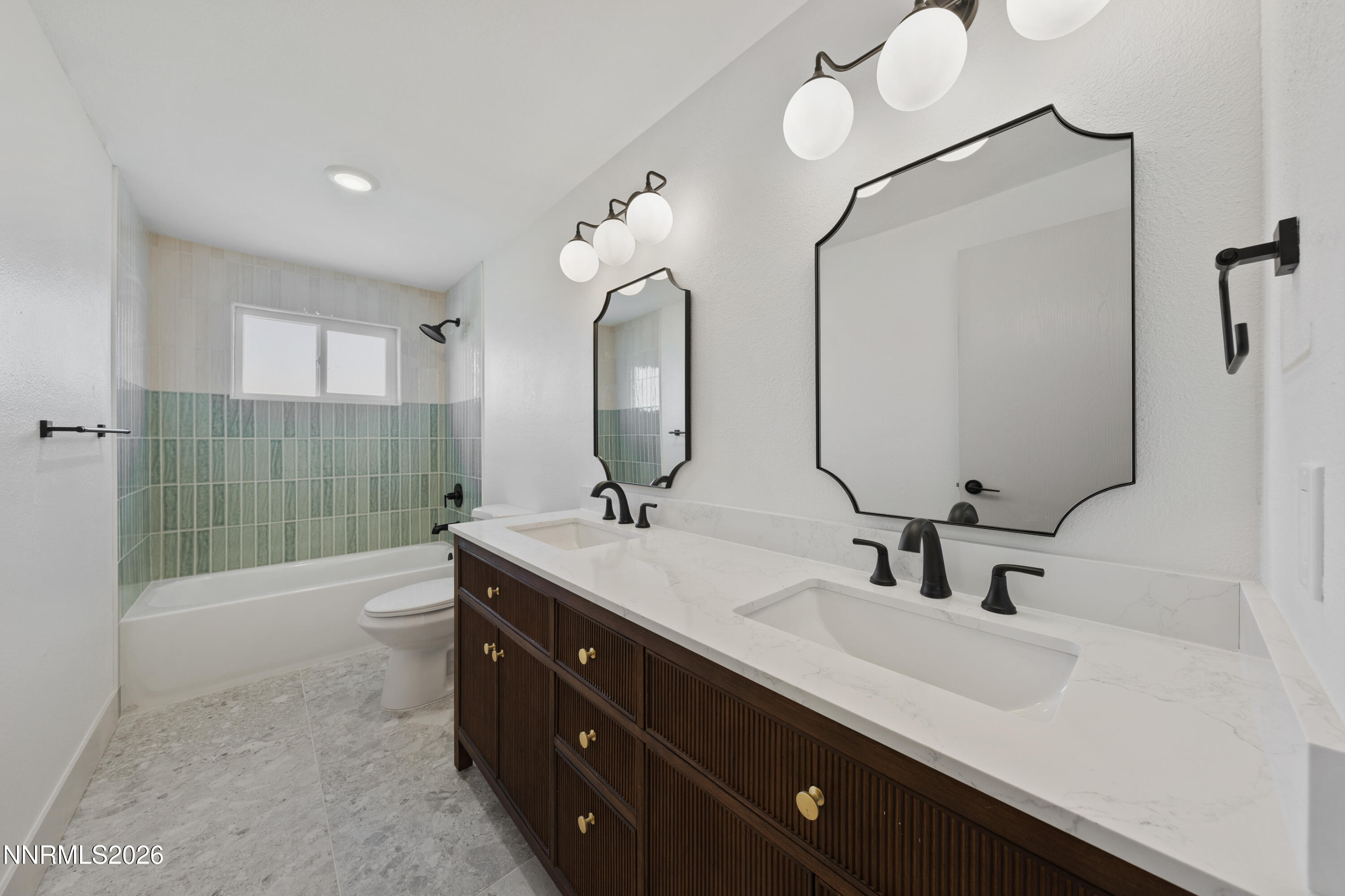 8 Zane Grey Lane Reno, NV 89523 - Photo 33 of 43 a bathroom with a double vanity sink mirror and shower