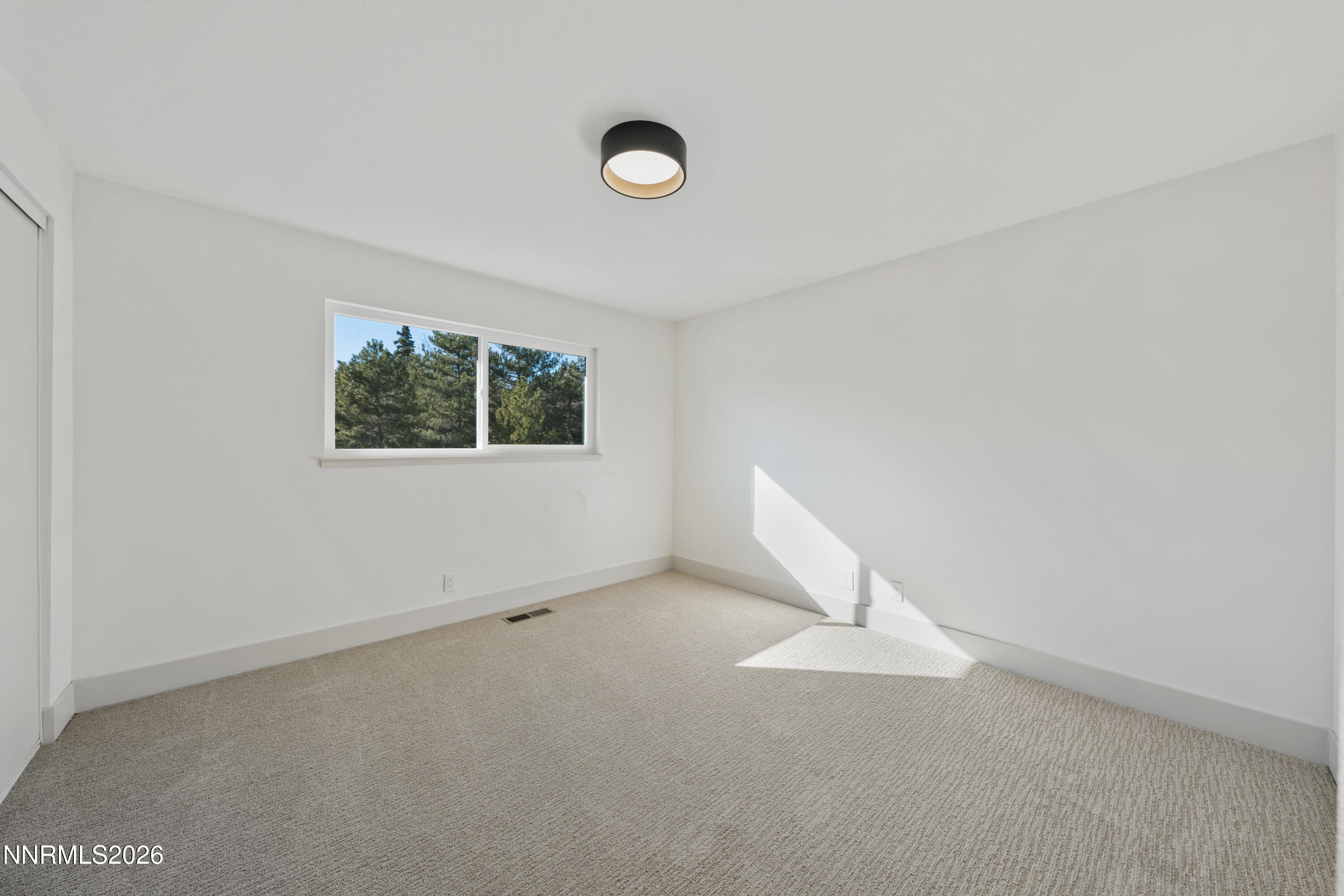 8 Zane Grey Lane Reno, NV 89523 - Photo 34 of 43 an empty room with a window