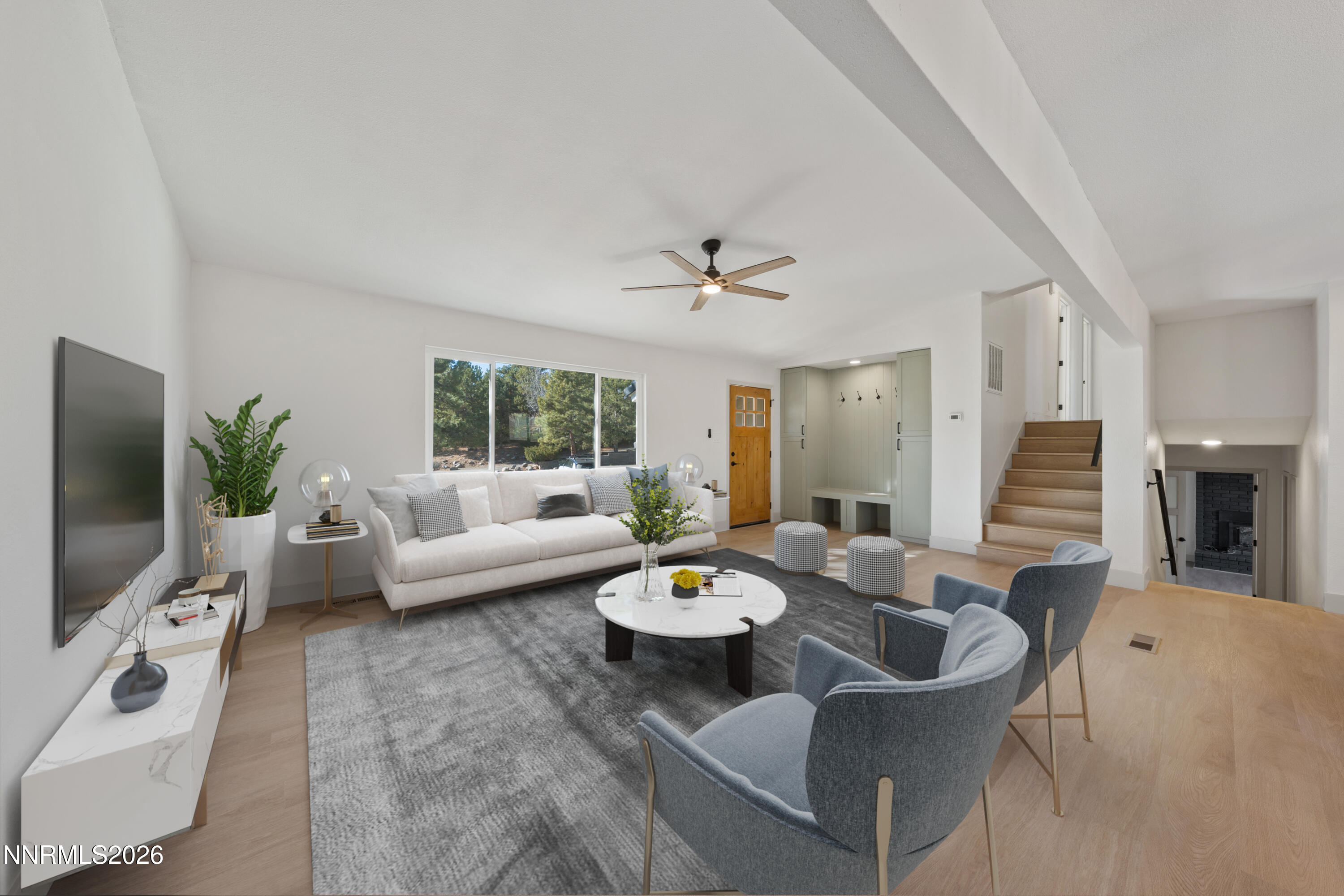 8 Zane Grey Lane Reno, NV 89523 - Photo 5 of 43 a living room with furniture and a flat screen tv
