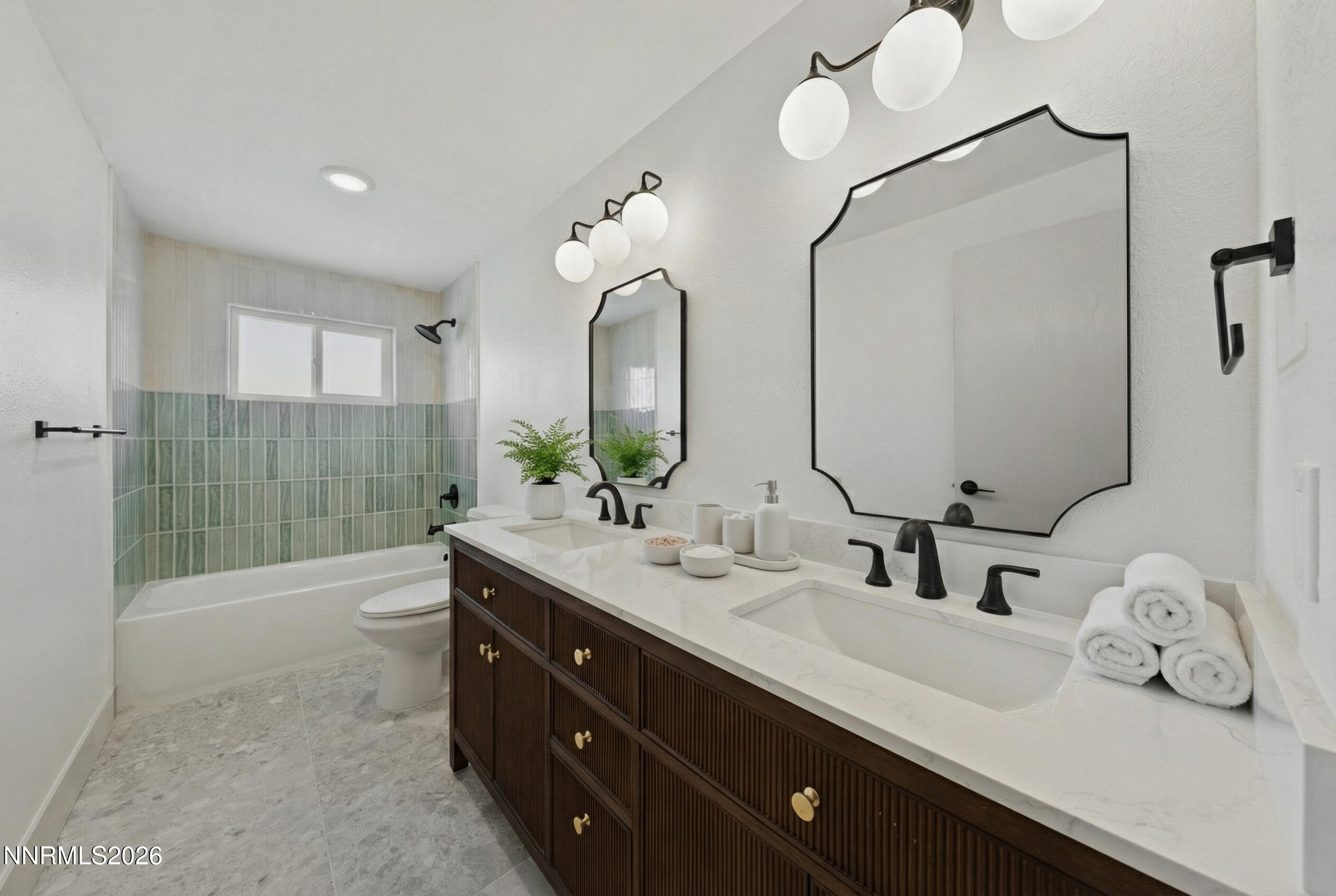 8 Zane Grey Lane Reno, NV 89523 - Photo 7 of 43 a bathroom with a double vanity sink and mirror