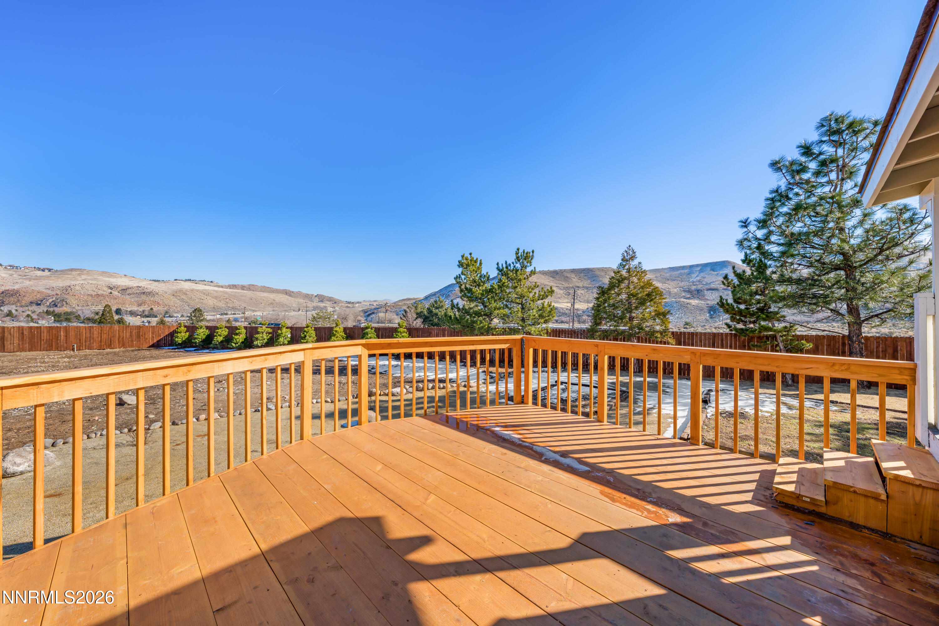 8 Zane Grey Lane Reno, NV 89523 - Photo 10 of 43 a view of balcony with wooden floor and fence