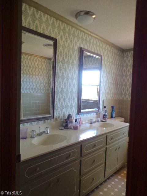 2066 Browns Crossroads Road Staley, NC 27355 - Photo 11 of 17 Spare Bath has Dble Vanities & Tile Flooring