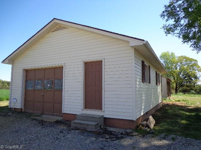 2066 Browns Crossroads Road Staley, NC 27355 - Photo 13 of 17 24 X 30 Wired Garage/Workshop w/Woodstove