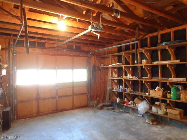2066 Browns Crossroads Road Staley, NC 27355 - Photo 14 of 17 Interior of Garage. Lots of shelving and storage