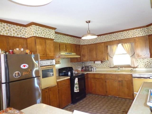 2066 Browns Crossroads Road Staley, NC 27355 - Photo 4 of 17 Spacious Kitchen w/Lots of Cabinet Space.