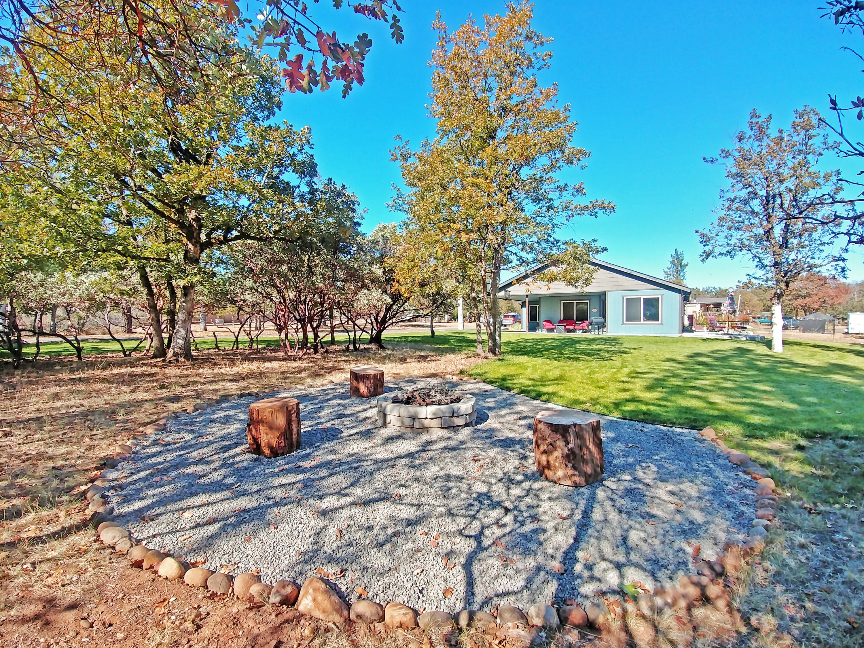 185 Drake Road Shady Cove, OR 97539 - Photo 18 of 30 Exterior and fire pit