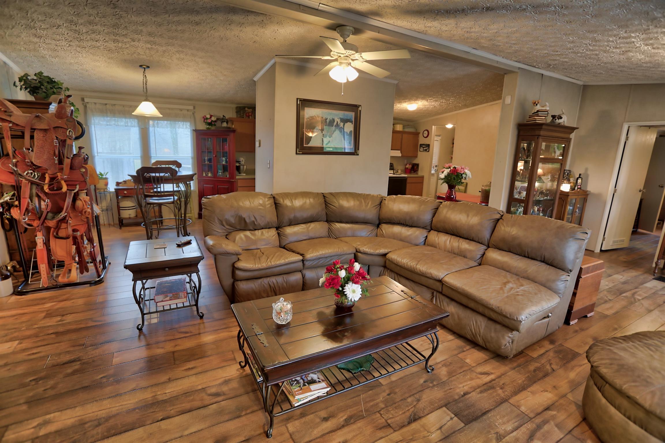 3686 Armstrong Road Springfield, TN 37172 - Photo 11 of 30 a living room with furniture and wooden floor