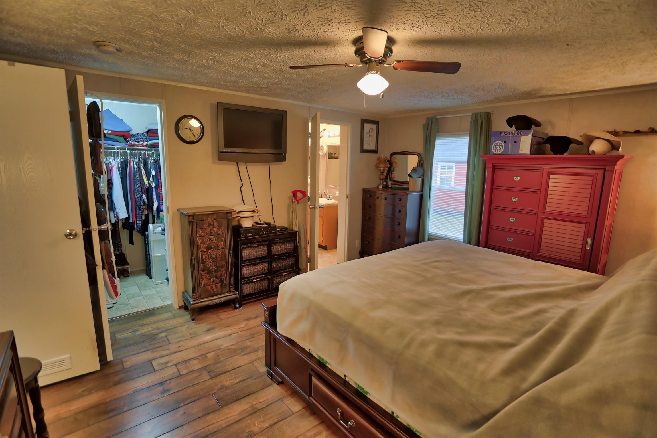 3686 Armstrong Road Springfield, TN 37172 - Photo 12 of 30 a bed room with a bed and a television