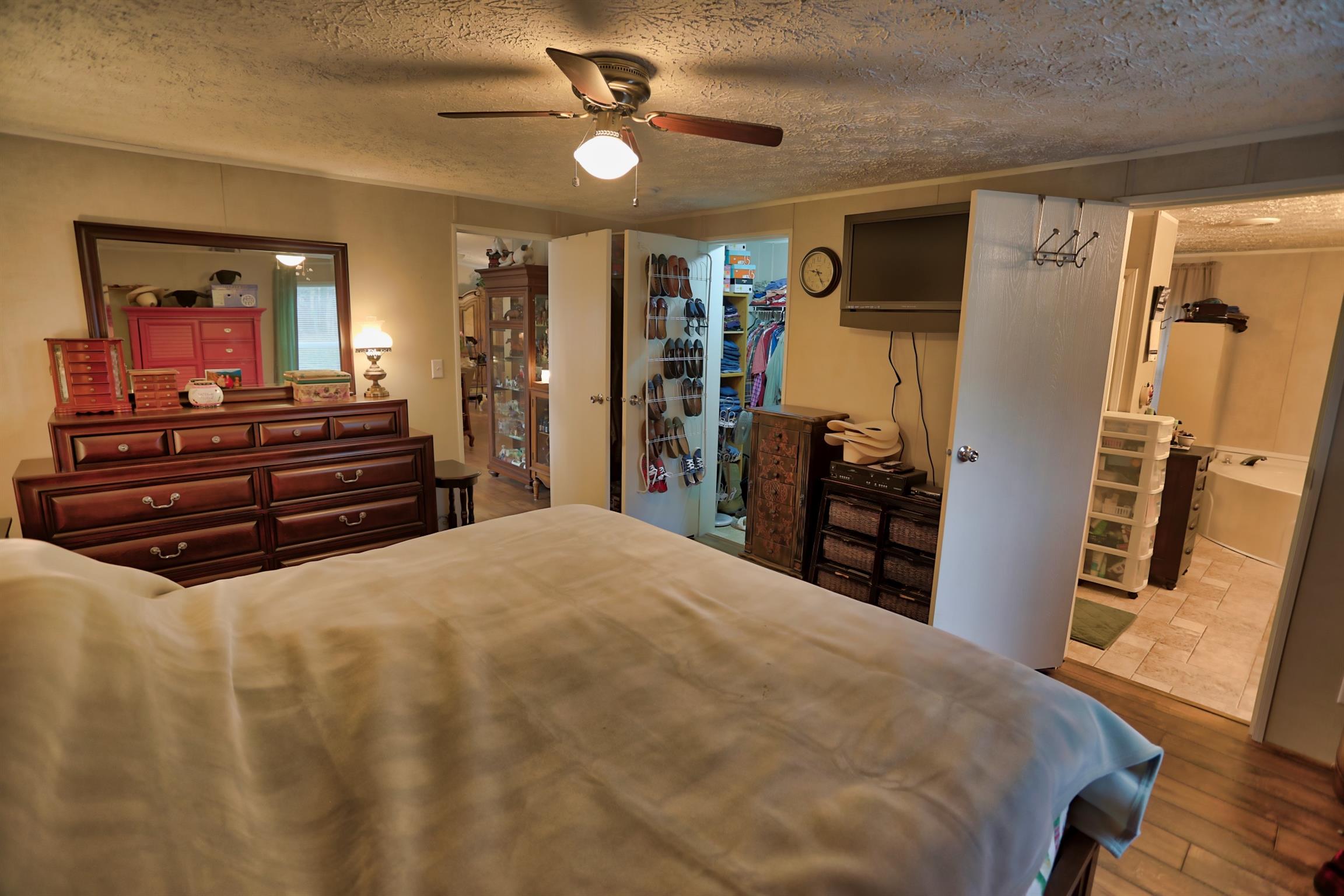 3686 Armstrong Road Springfield, TN 37172 - Photo 14 of 30 a bed room with a bed and a television
