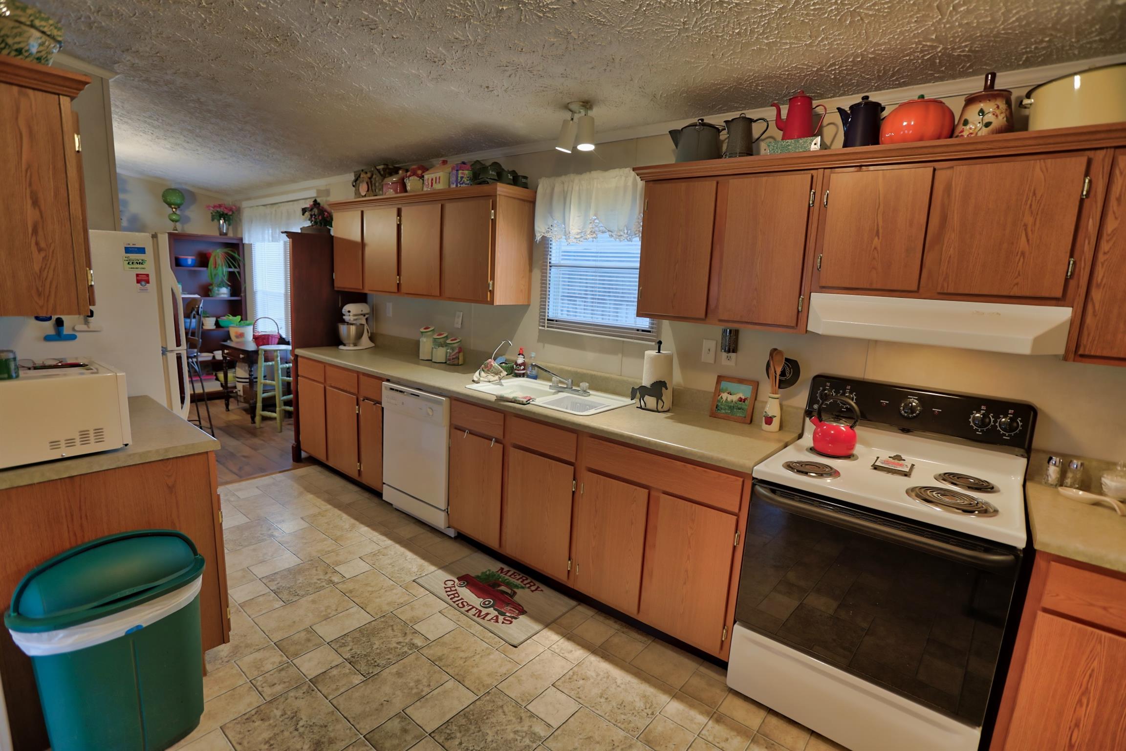 3686 Armstrong Road Springfield, TN 37172 - Photo 18 of 30 a kitchen with a sink stove and cabinets