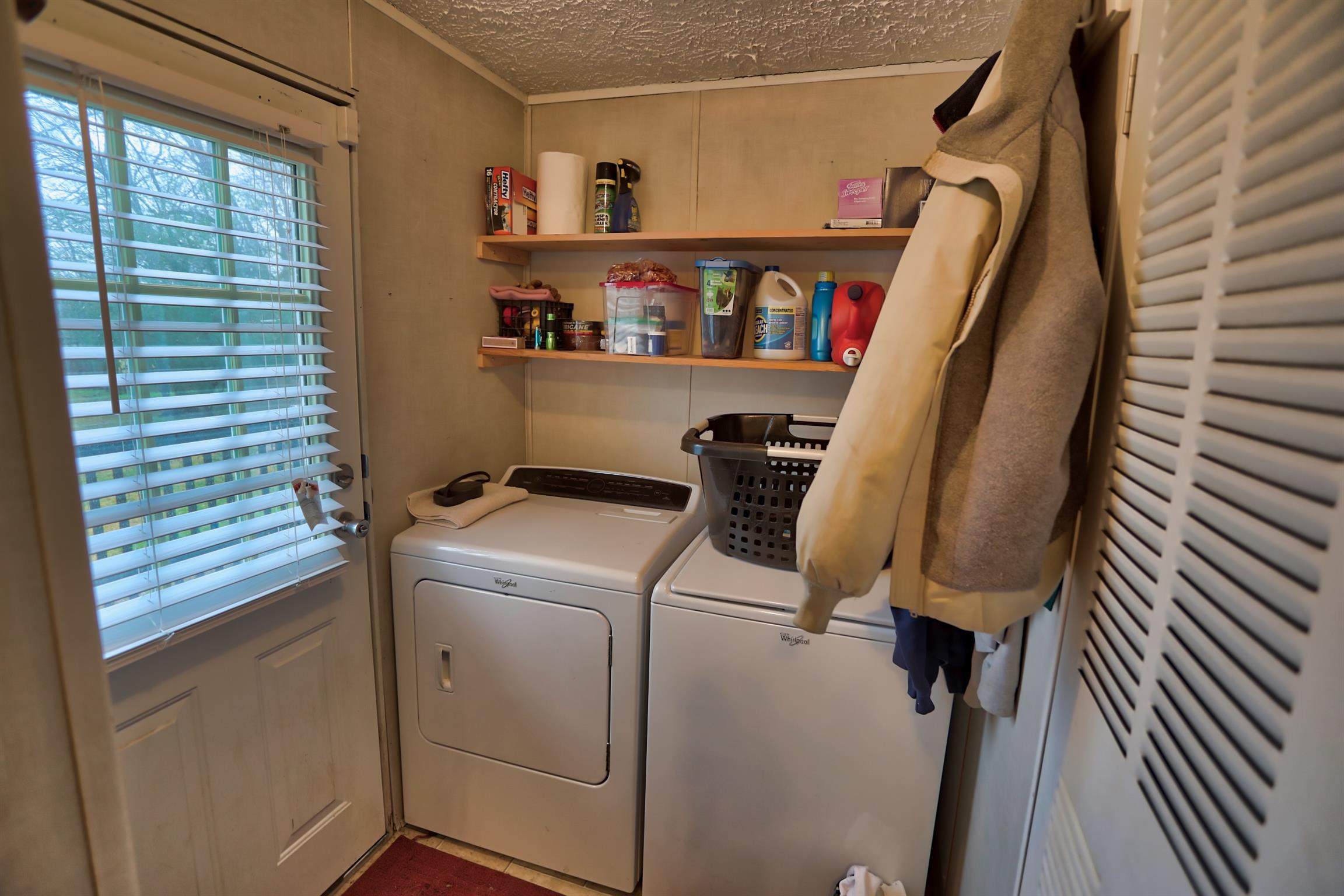 3686 Armstrong Road Springfield, TN 37172 - Photo 20 of 30 a view of walk in closet with clothes and shoes