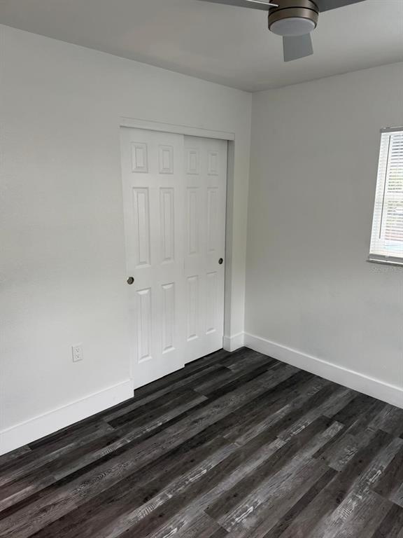 Undisclosed Address Port Richey, FL 34668 - Photo 12 of 19 a view of room with wooden floor