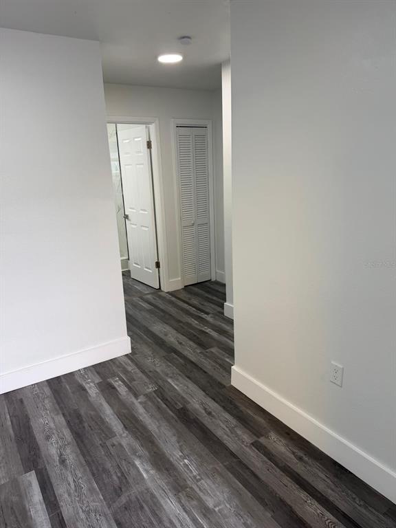 Undisclosed Address Port Richey, FL 34668 - Photo 4 of 19 a view of a room with wooden floor