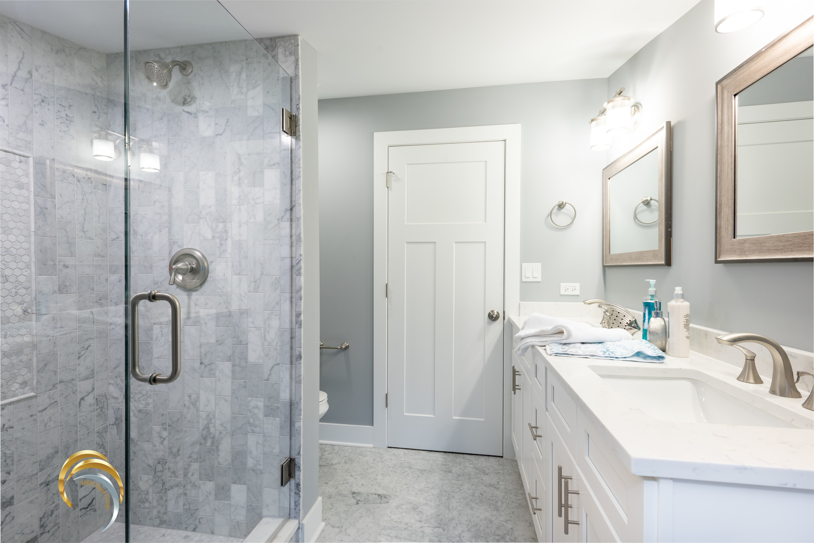 212 Gage Road Riverside, IL 60546 - Photo 12 of 19 a bathroom with a sink a toilet a mirror and shower