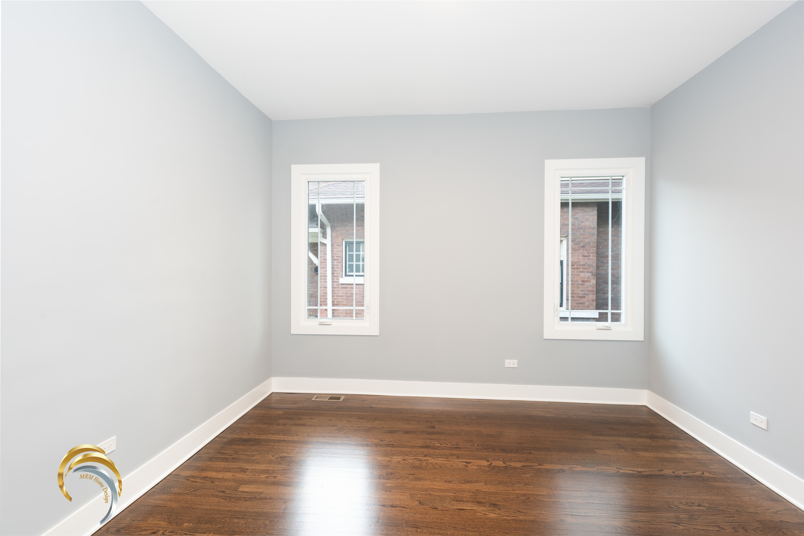 212 Gage Road Riverside, IL 60546 - Photo 16 of 19 an empty room with wooden floor window and wooden floor