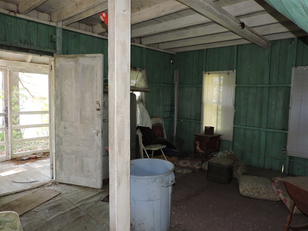 4 Long Island Webster, MA 01570 - Photo 15 of 27 a balcony with table and chairs