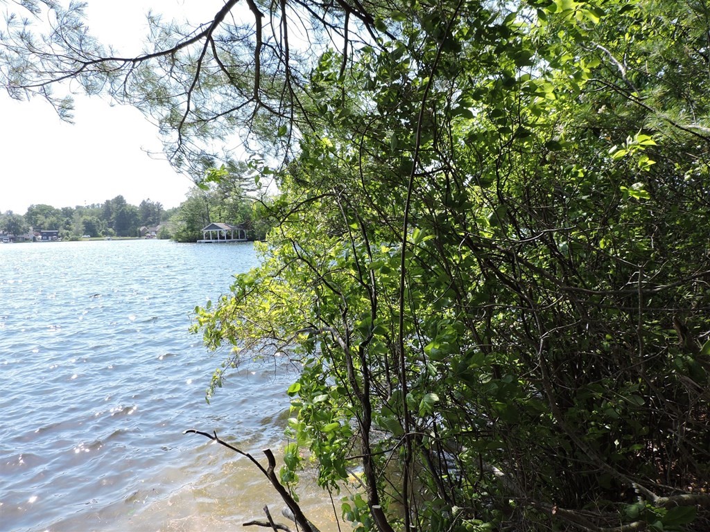 4 Long Island Webster, MA 01570 - Photo 4 of 27 a view of a lake from a yard