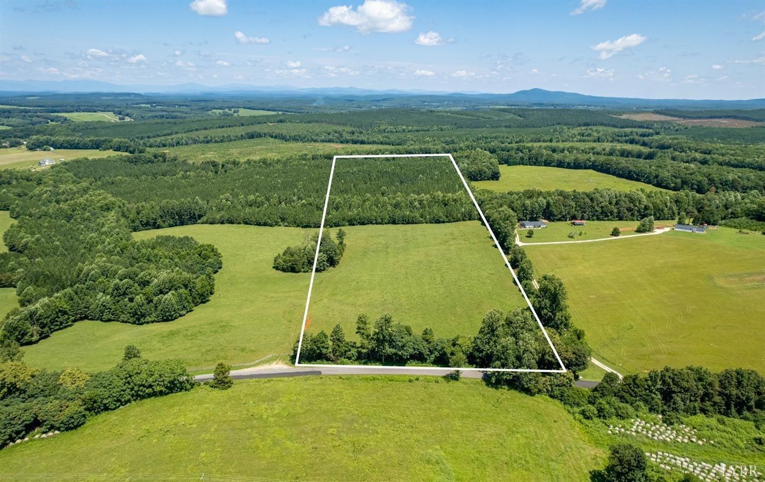 7 Piney Mountain Road Appomattox, VA 24522 - Photo 1 of 24 a view of a field with an ocean
