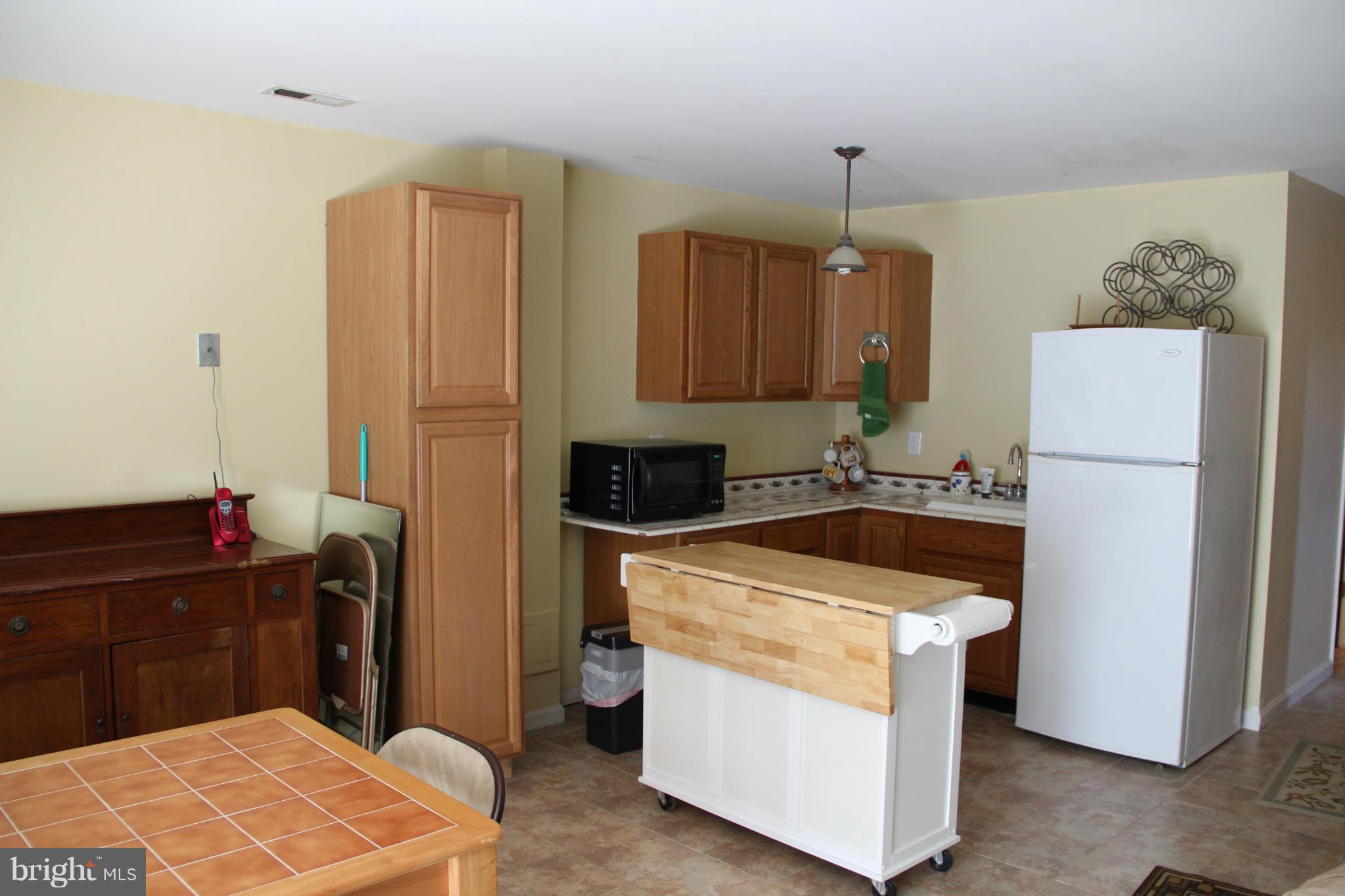 3155 Plum Point Road Huntingtown, MD 20639 - Photo 11 of 29 Downstairs Kitchenette