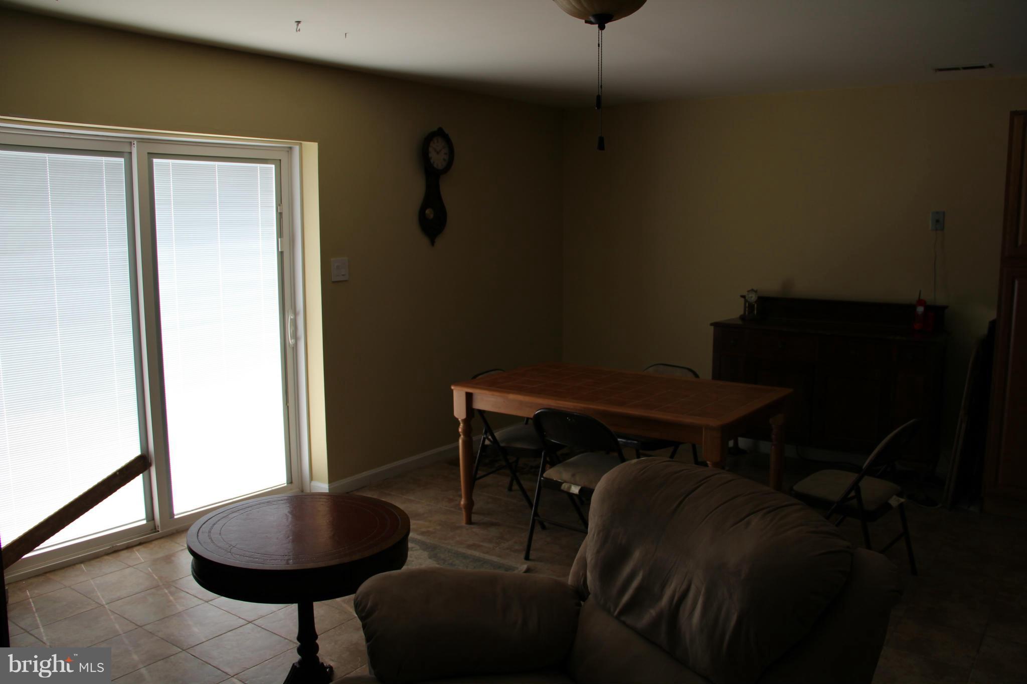 3155 Plum Point Road Huntingtown, MD 20639 - Photo 12 of 29 Downstairs Kitchenette Area