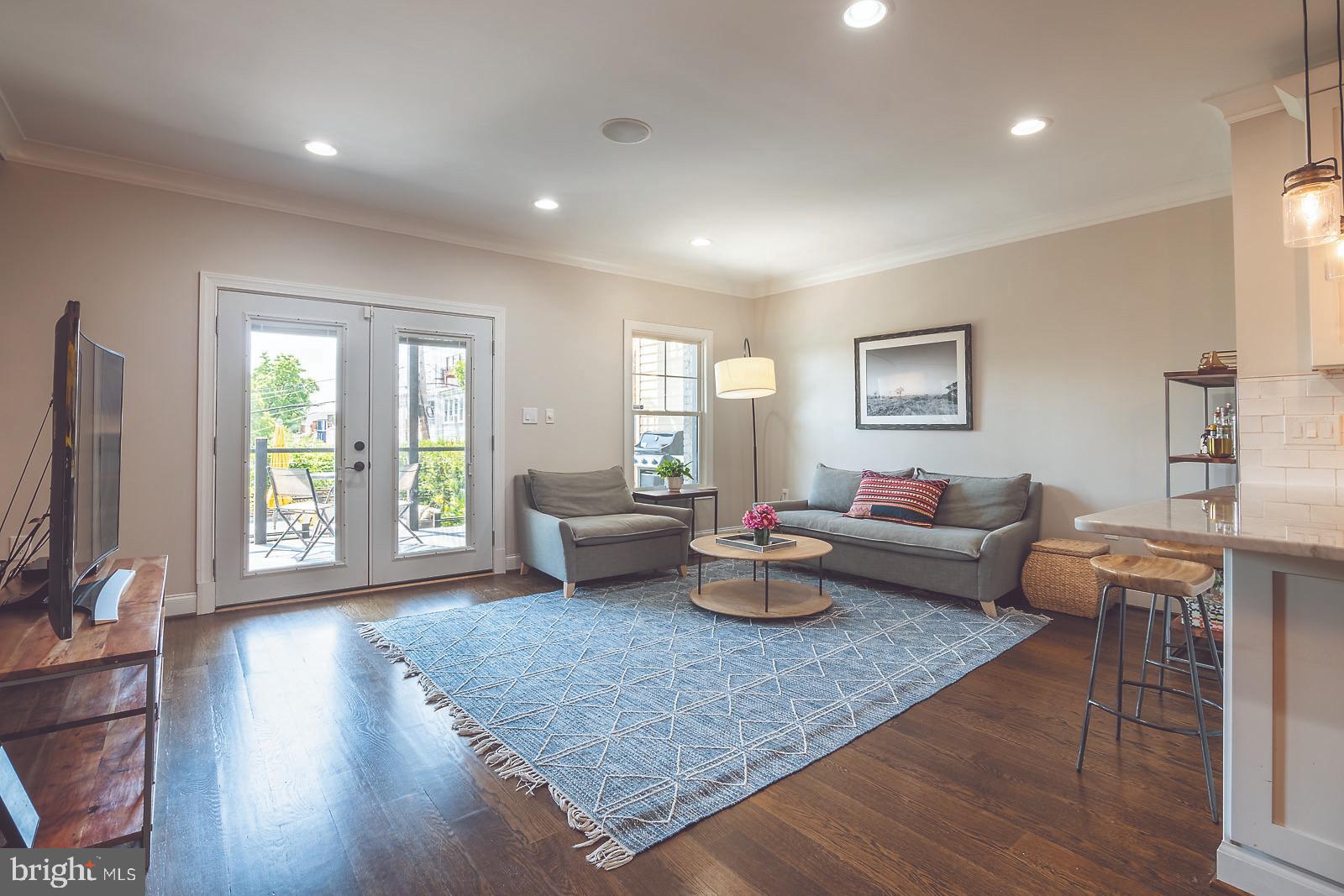 2026 North Capitol Street Northwest, Unit 1 Washington, DC 20002 - Photo 12 of 53 Living room with great natural light