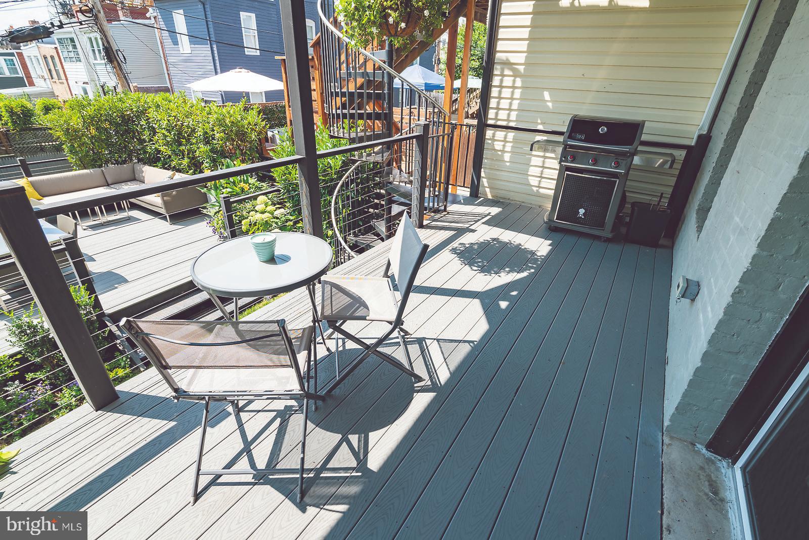 2026 North Capitol Street Northwest, Unit 1 Washington, DC 20002 - Photo 18 of 53 Private back deck #1 with grill that conveys