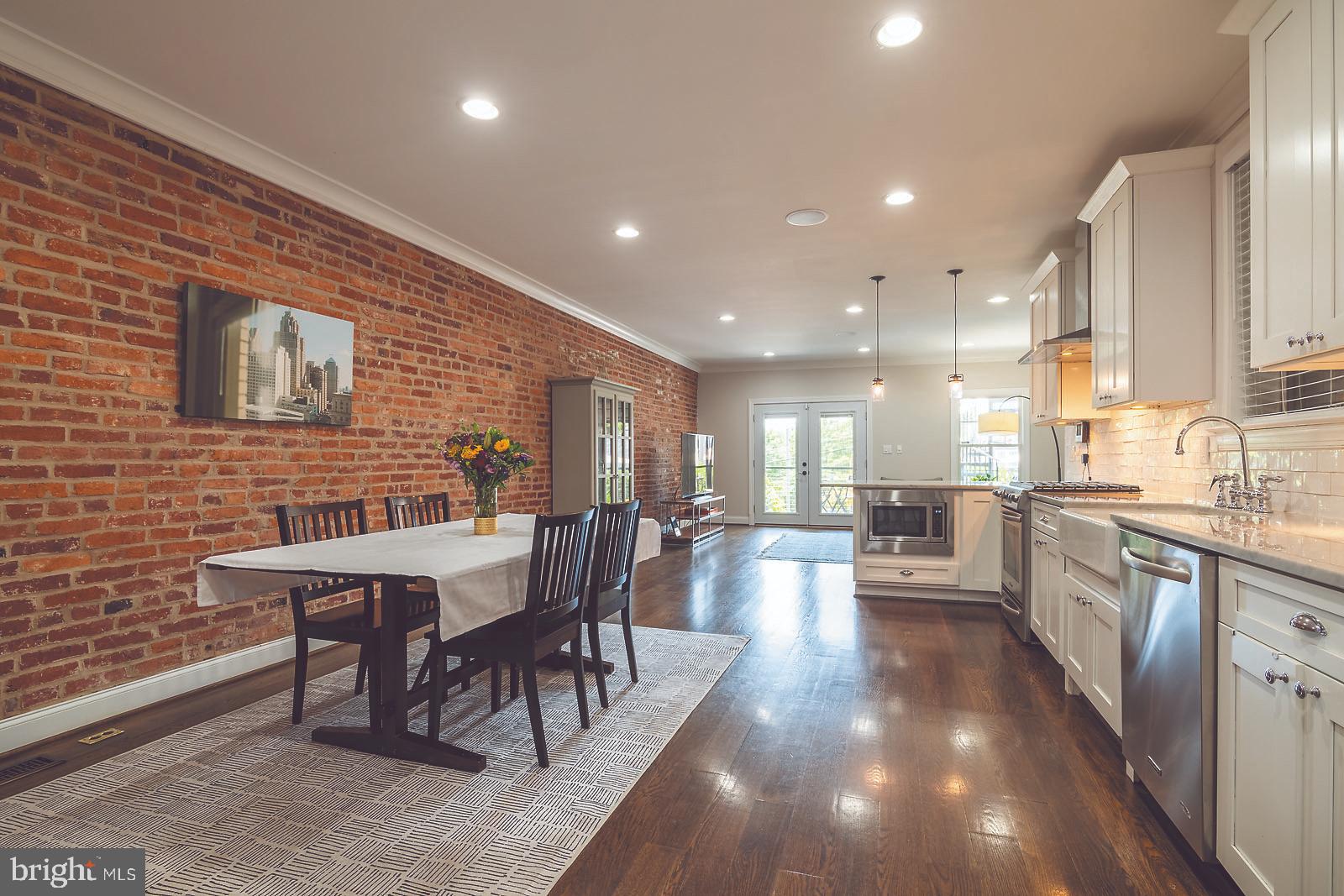 2026 North Capitol Street Northwest, Unit 1 Washington, DC 20002 - Photo 3 of 53 Open layout kitchen, dining, and living room