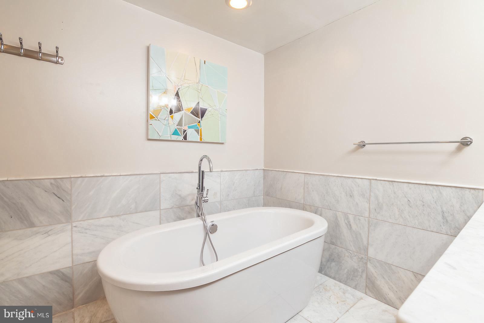 2026 North Capitol Street Northwest, Unit 1 Washington, DC 20002 - Photo 34 of 53 En suite master bathroom soaking tub