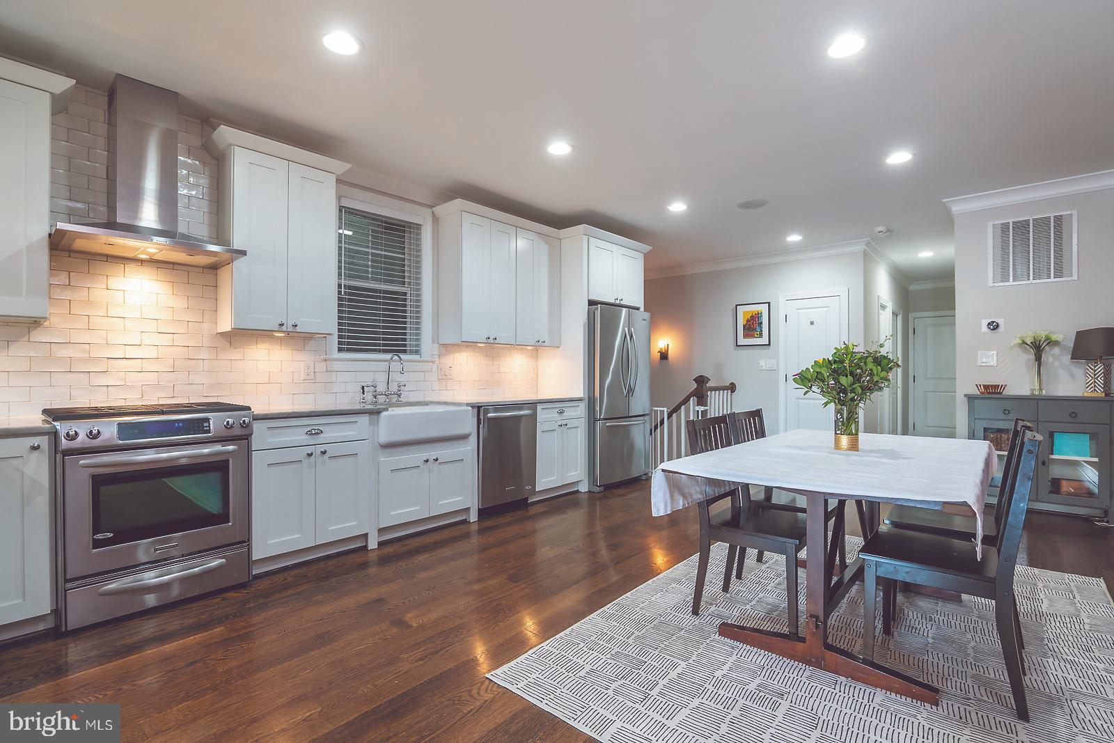 2026 North Capitol Street Northwest, Unit 1 Washington, DC 20002 - Photo 9 of 53 Kitchen and dining area