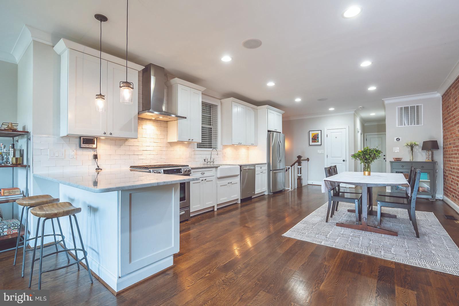 2026 North Capitol Street Northwest, Unit 1 Washington, DC 20002 - Photo 10 of 53 Kitchen and dining area