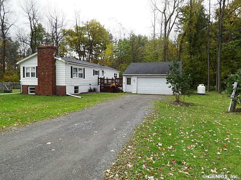 2276 West Walworth Road Macedon, NY 14502 - Photo 1 of 1 Exterior Front. Big front yard leading to 2-car ga
