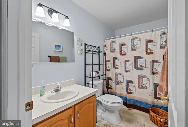 a view of a hallway with washer and dryer