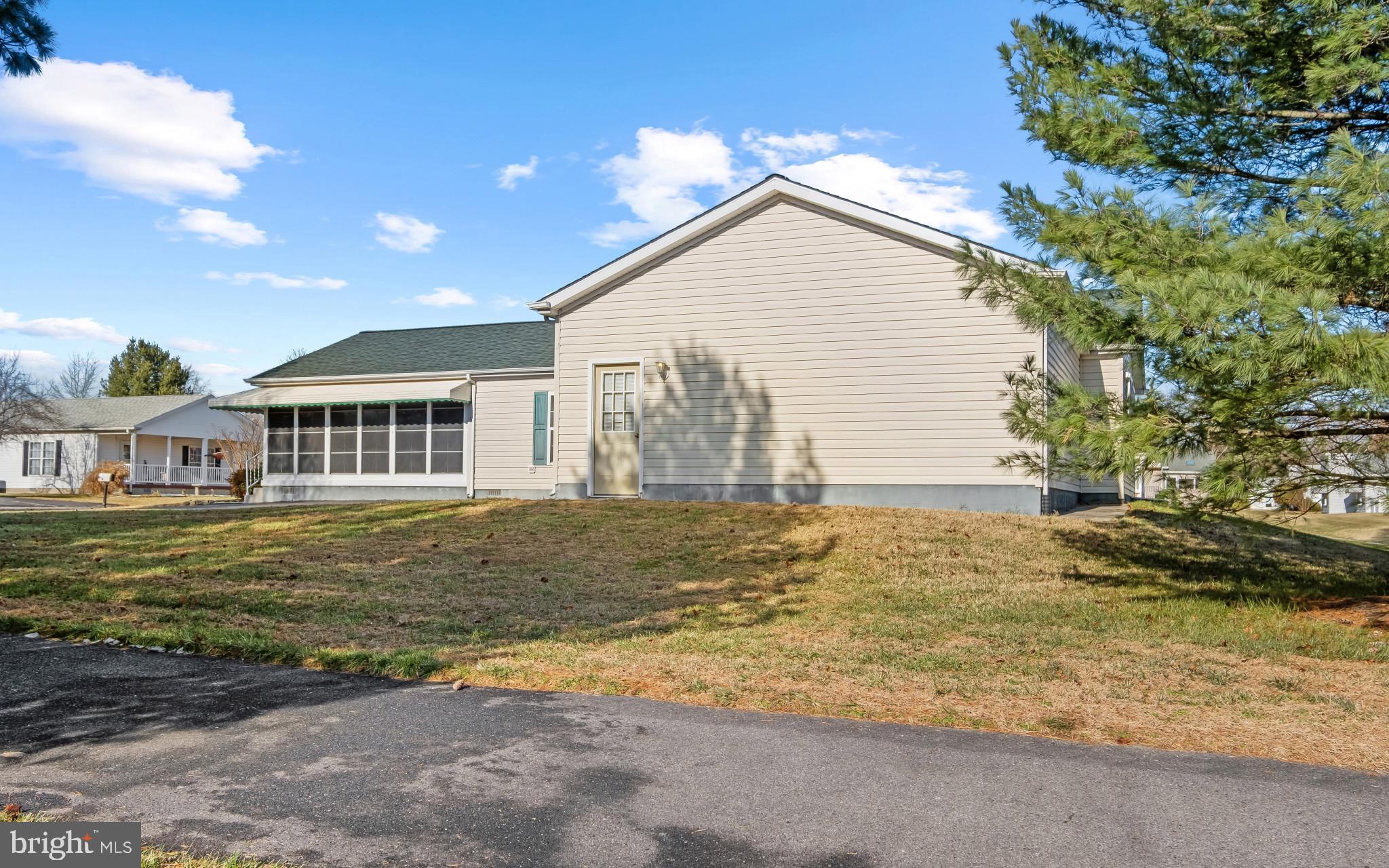55 Wallace Lane Camden, DE 19934 - Photo 26 of 44 Garage side door access to walking trail