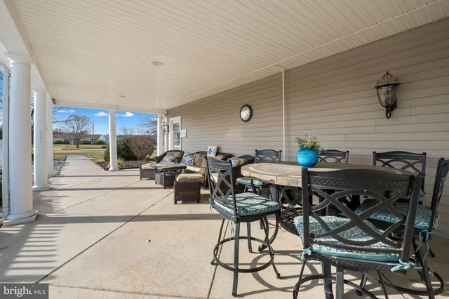 a table with flowers in front of it