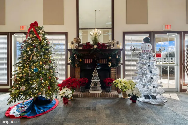 a view of a big room with lots of gym equipment