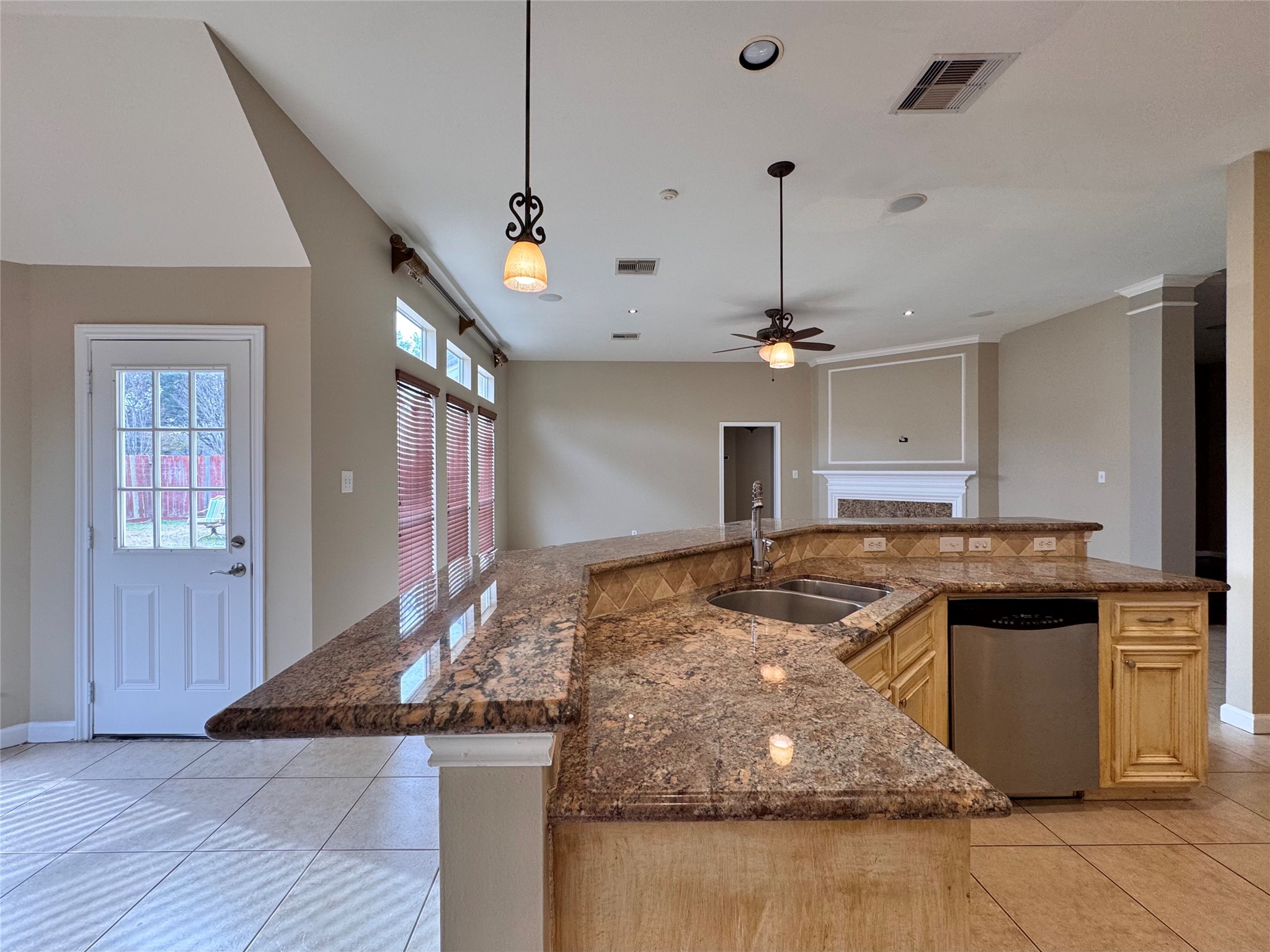17243 Rush Trace Court Houston, TX 77095 - Photo 15 of 49 a kitchen with stainless steel appliances granite countertop a sink a counter top space cabinets and wooden floor